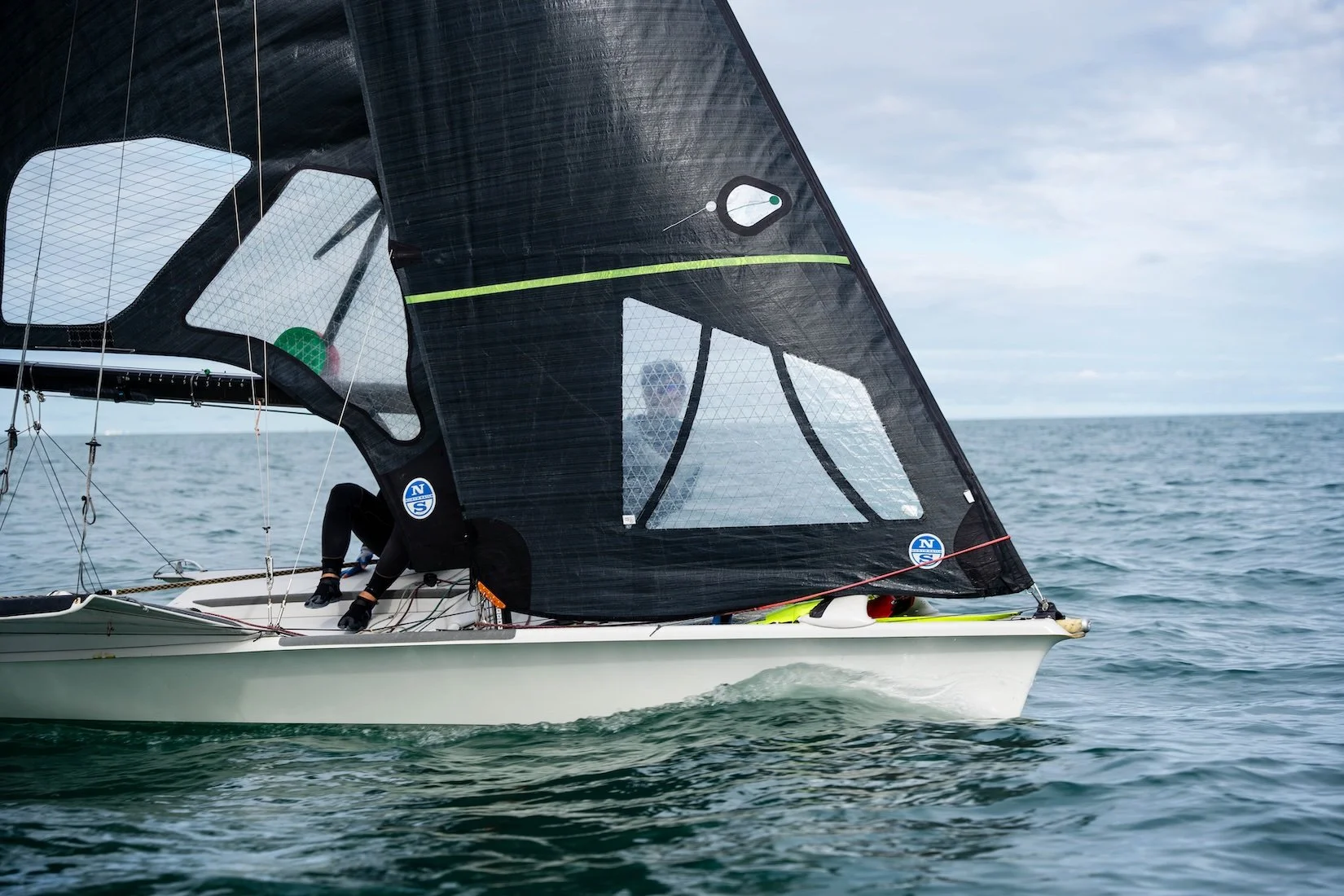 Skiff sailors training on the water
